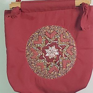 Hand quilted purse or bag. Reversible Maroon and flowered fabric like cotton